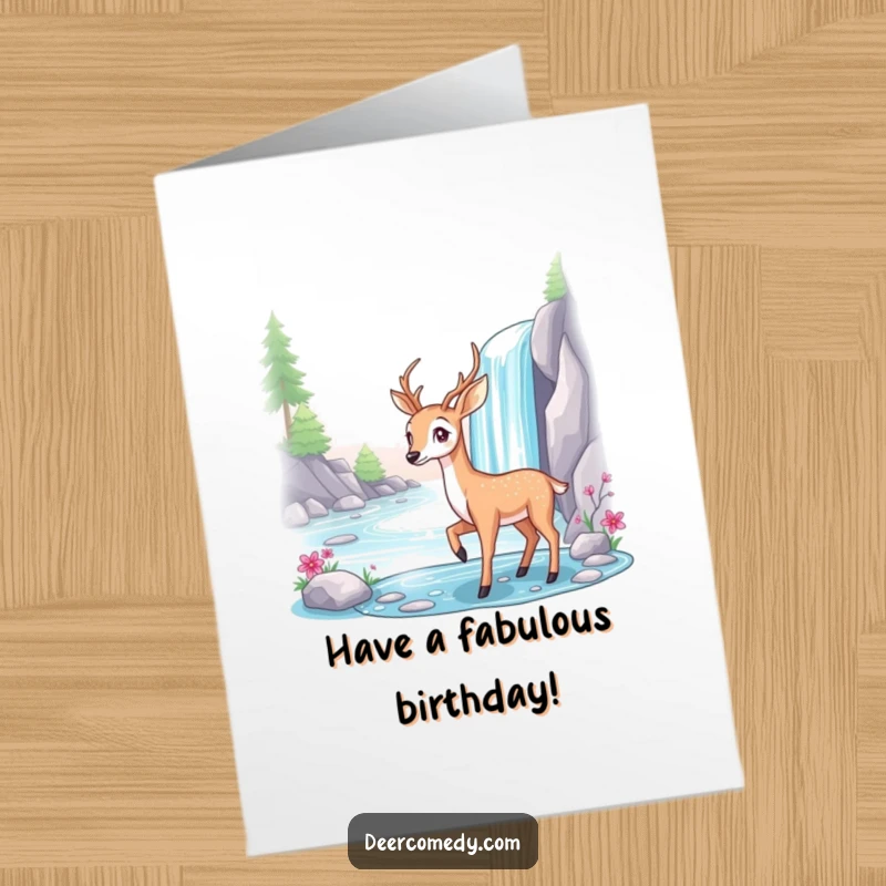 Funny Free Printable Birthday Card: A graceful deer poses elegantly next to a sparkling waterfall, conveying a tranquil birthday wish.